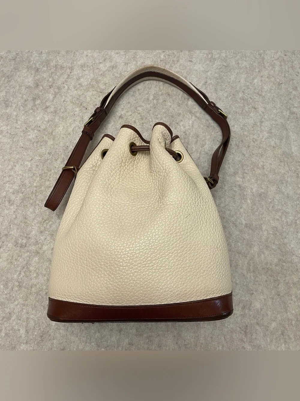 Dooney & Bourke Vintage Y2K Leather Bone/Cream with Brown Trim Bucket Bag Purse